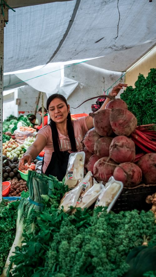Free Colorful scene at a bustling farmers market in Puebla, showcasing diverse fresh produce and local culture. Stock Photo