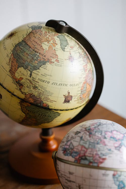 Globes on Wooden Table 