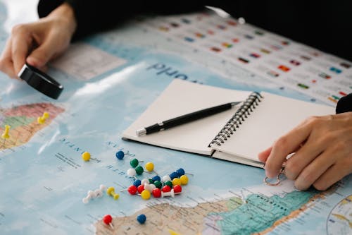 Close up of a Map and Multicoloured Pins