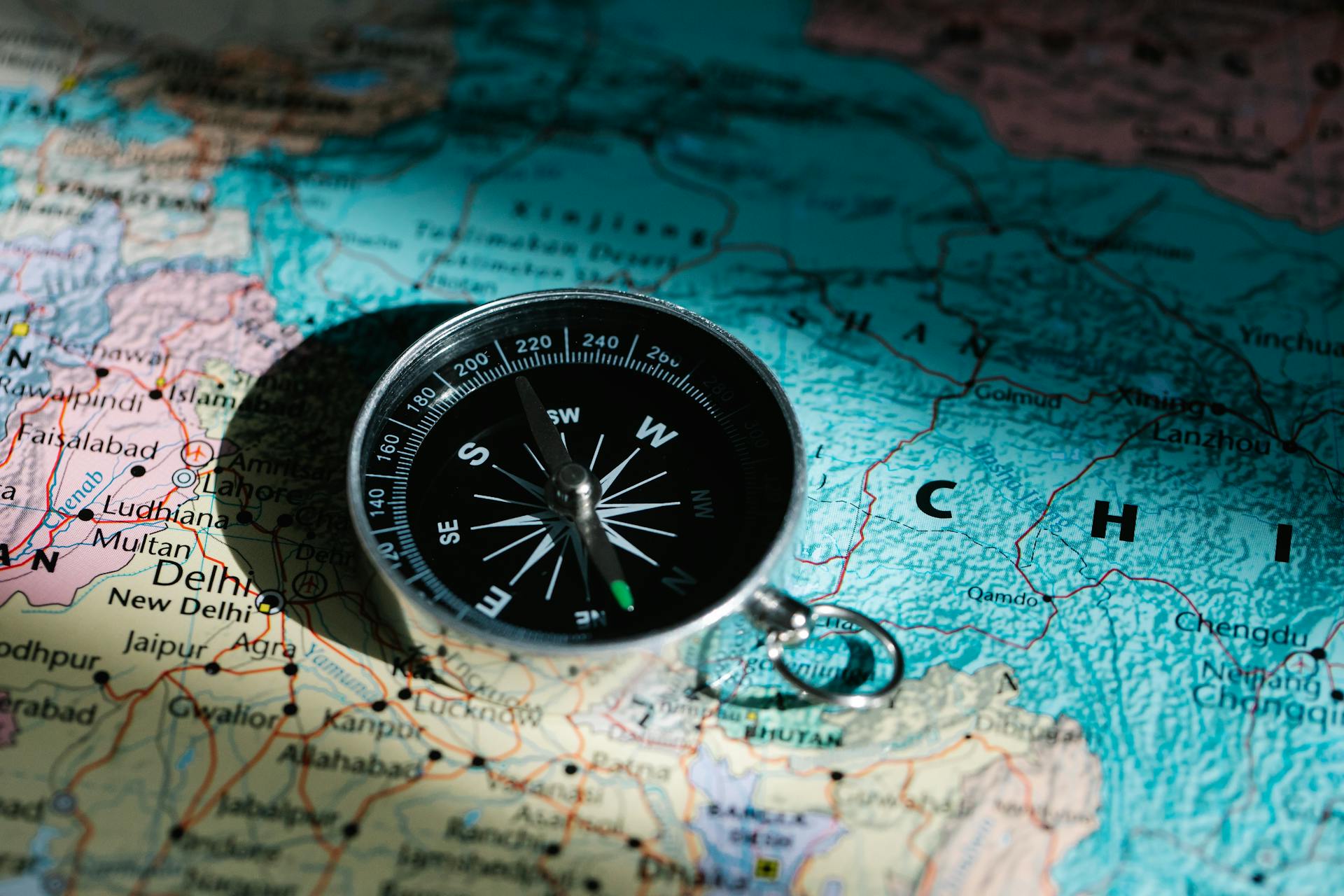 Compass Lying on Map