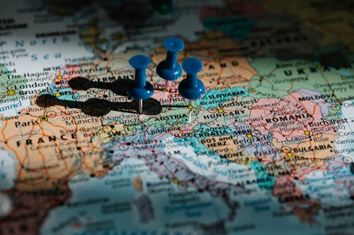 Free Blue Pushpins on Administrative Map of Europe Stock Photo