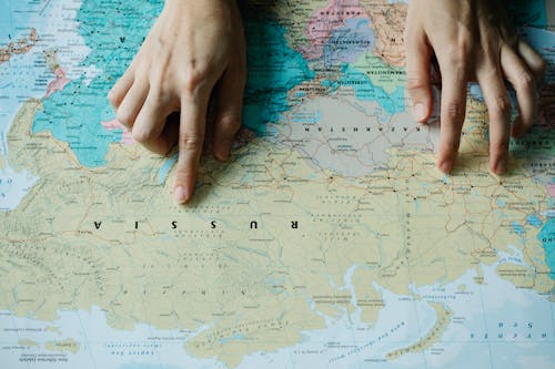 Free Pointing Russia in a World Map Stock Photo