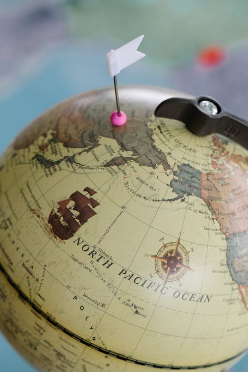 A Miniature Flag on a Globe