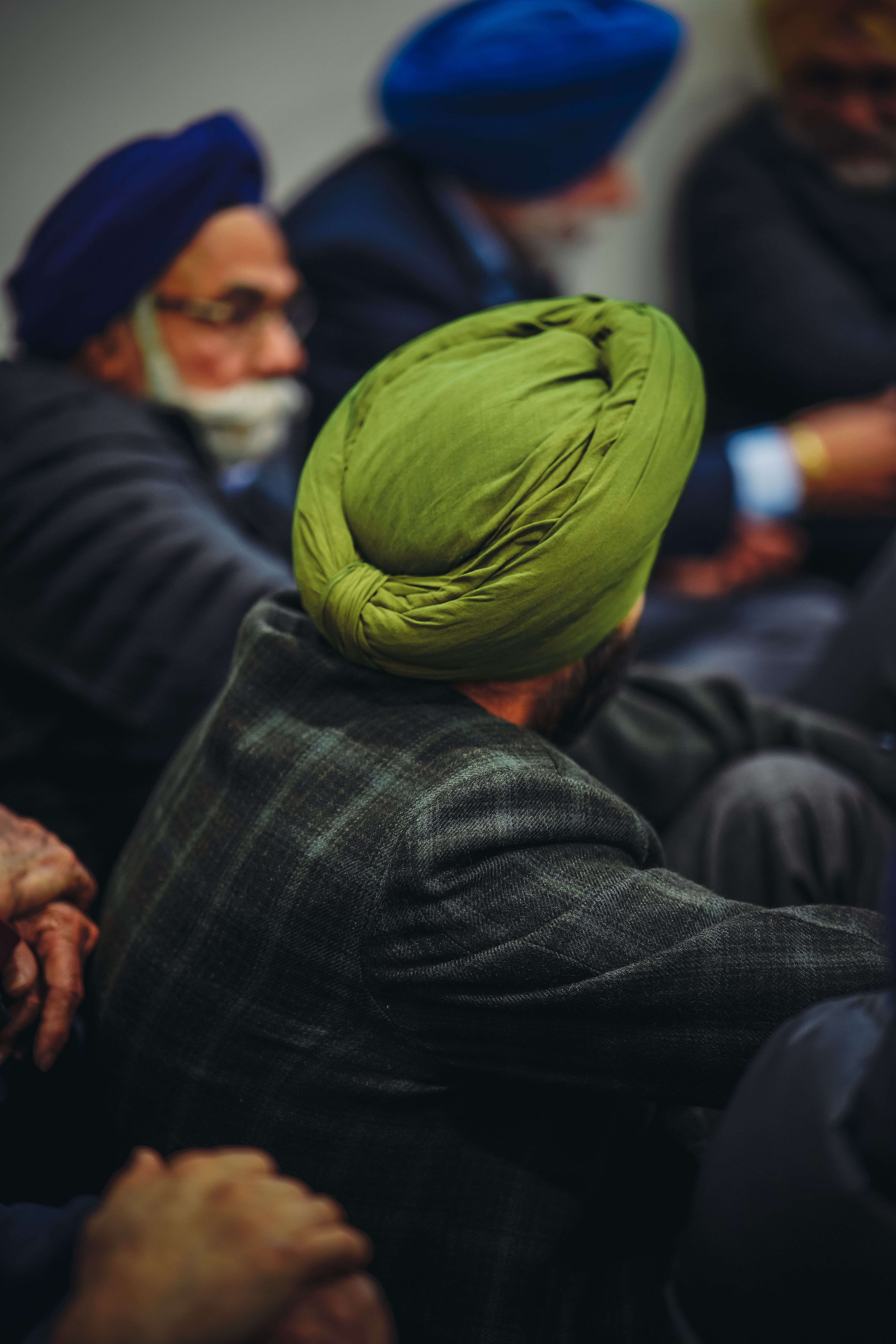 Men in Turbans Sitting on the Floor · Free Stock Photo