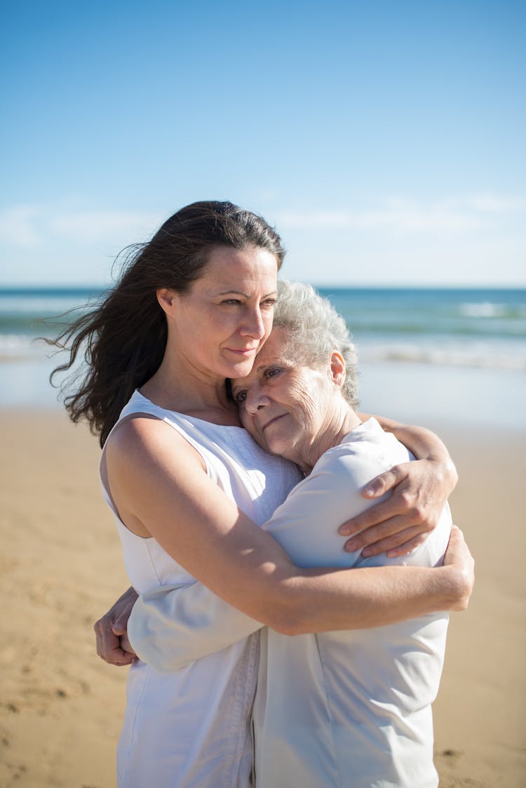 Mother And Daughter Hugging Each Other