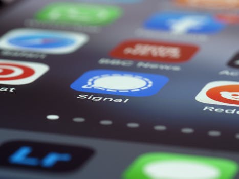 Detailed view of various app icons on a smartphone screen highlighting Signal app.