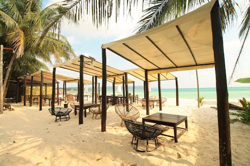 Beach Restaurant with Comfortable Chairs and Canopies