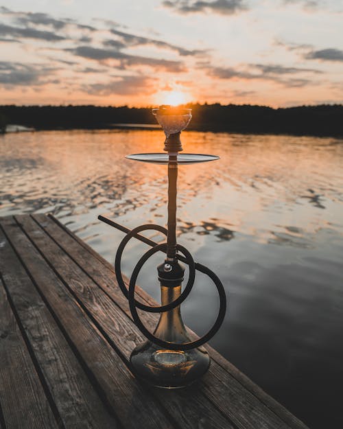 Water Pipe on a Jetty at Sunset