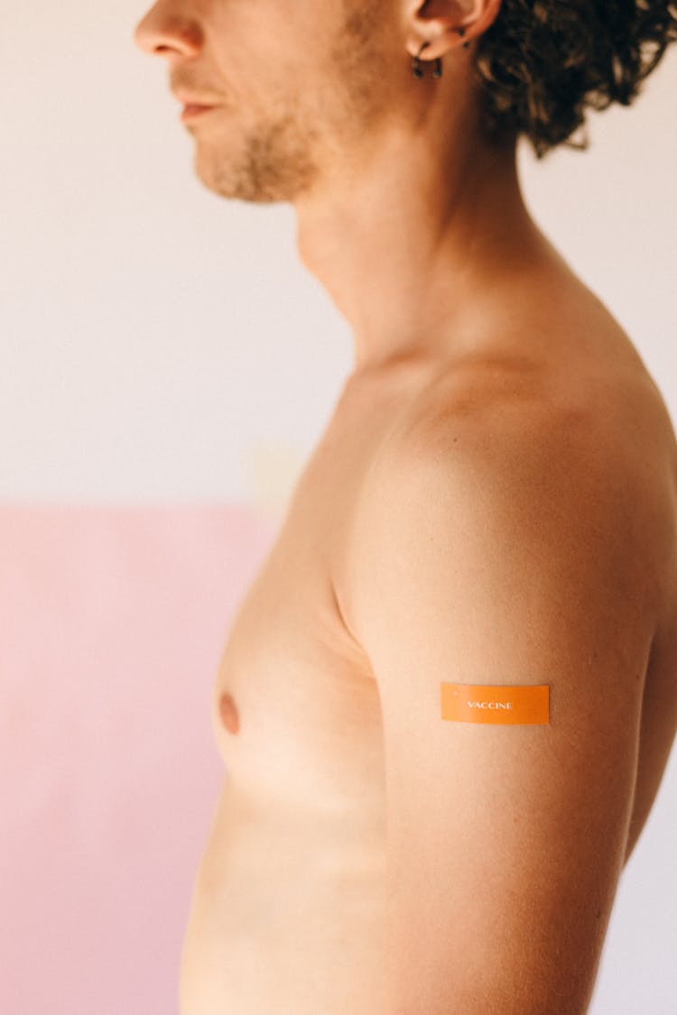 Vaccine Sticker On Bare Shoulder