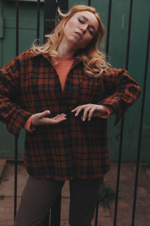 Blonde Woman in a Checkered Shirt Outdoors · Free Stock Photo