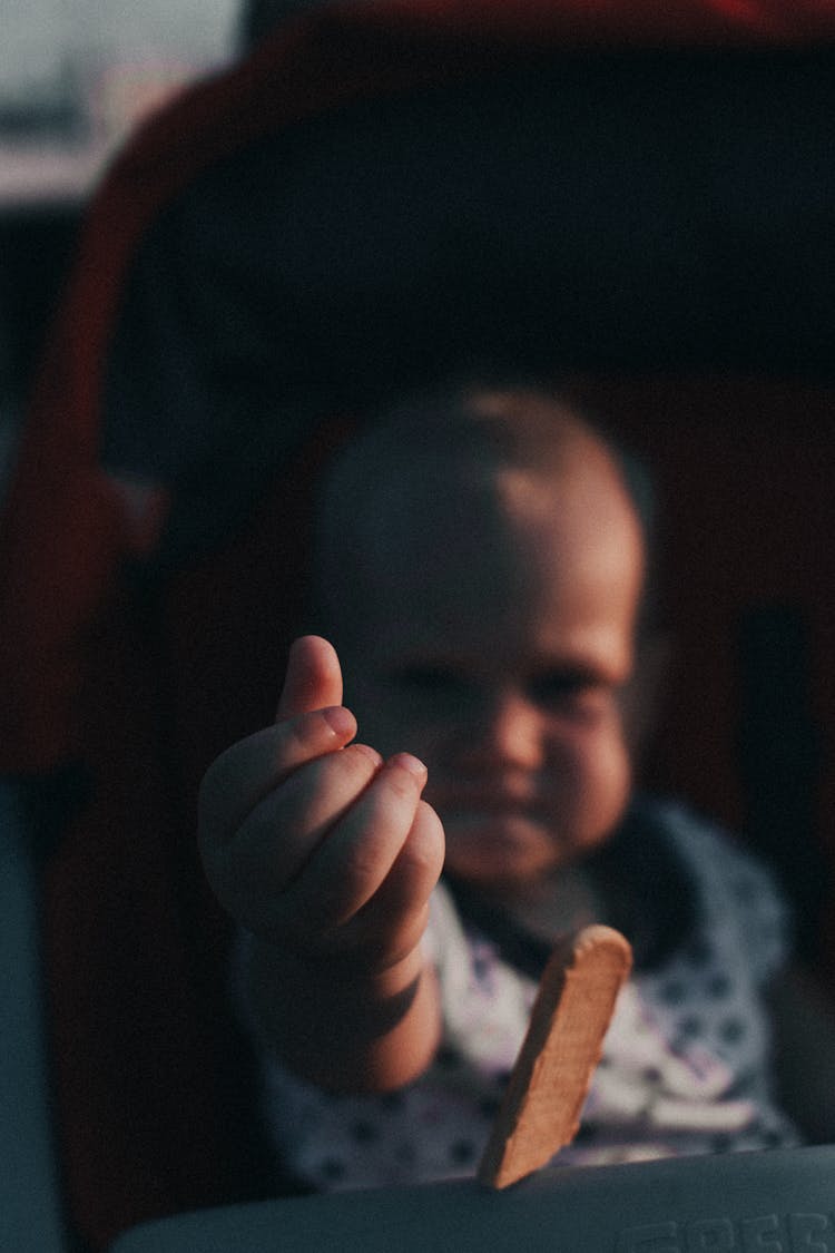 Baby Making A Heart On Its Hand