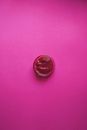 Silver Round Coin on Pink Textile