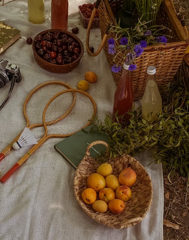 Food And Drinks On Picnic Blanket