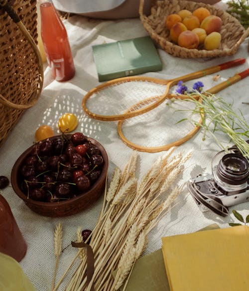 Ears of Grain, Cherries and Tennis Rackets on Table