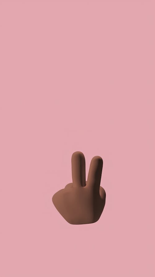 Peace Sign Emoji on Light Pink Background