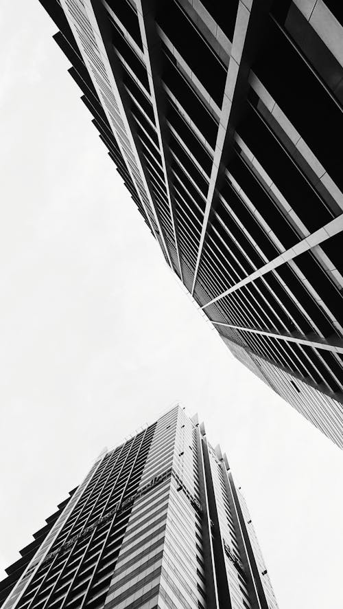 Free A Grayscale Photo of High Rise Buildings Stock Photo