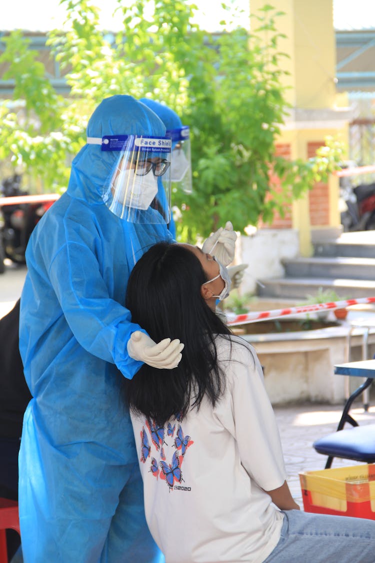 A Woman Getting A Nasal Swab Test