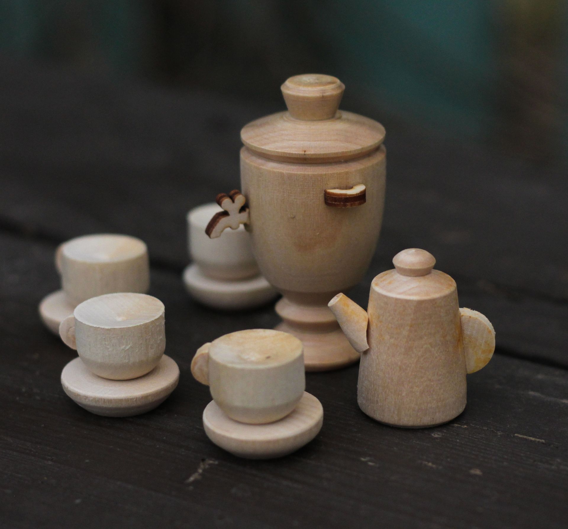 Miniature Wooden Toys in Close-up Photography