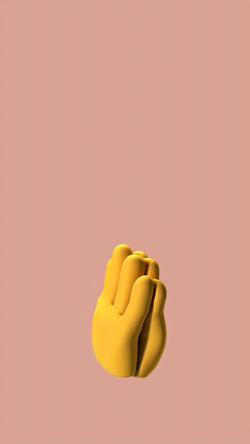 Emoji of a Hand on Beige Background