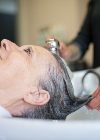Close-up of hair color application