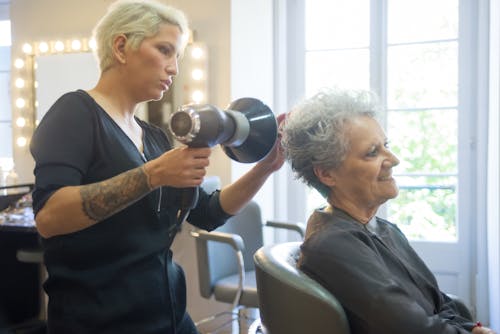 An Elderly Having a Haircut