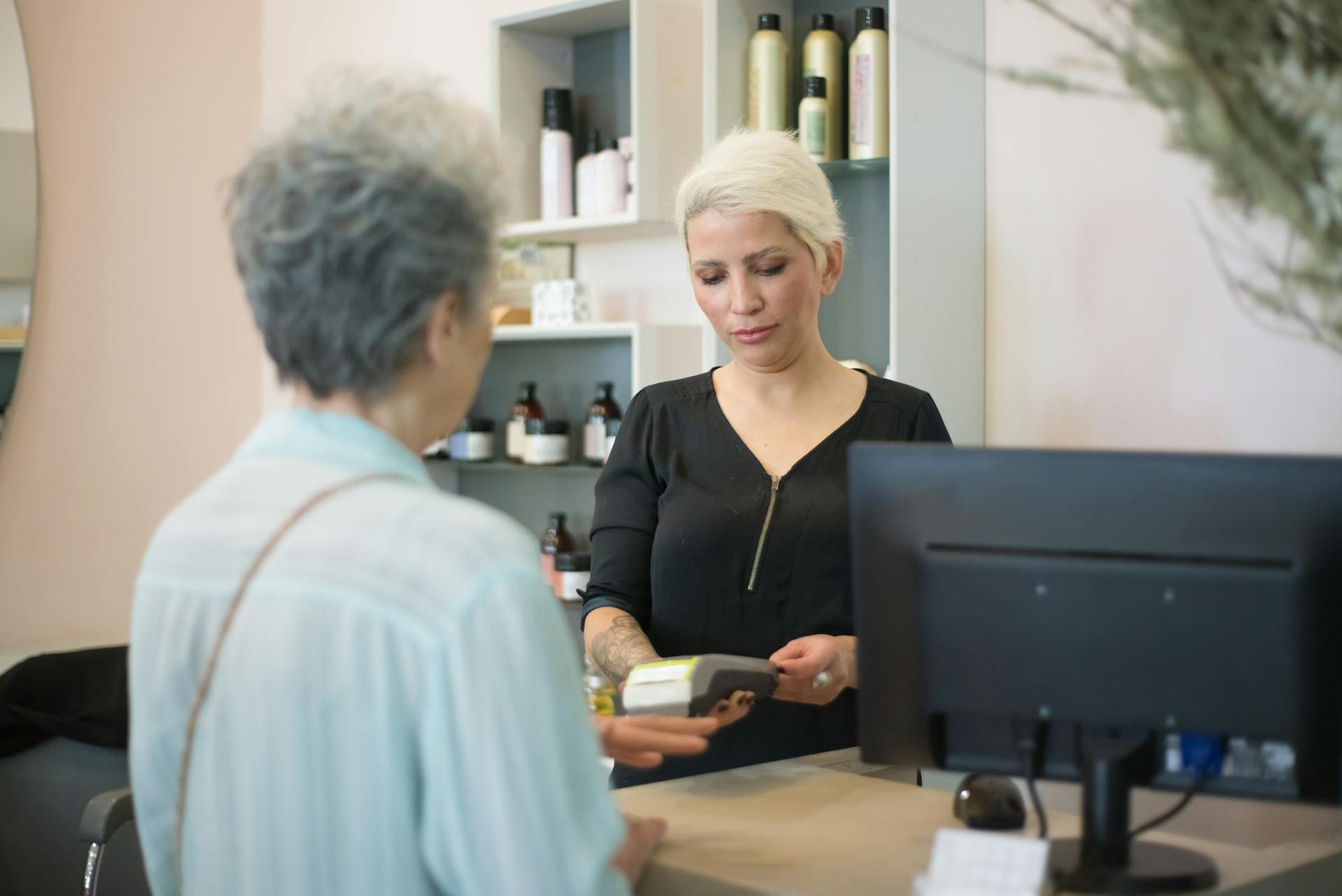 A Woman Scanning a Card