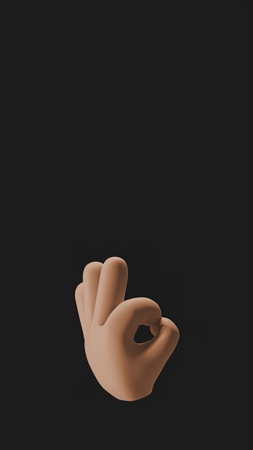 Free An Animation of Emoji Hand on a Black Background Stock Photo