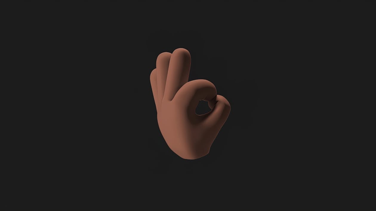An Animation of Emoji Hand on a Black Background