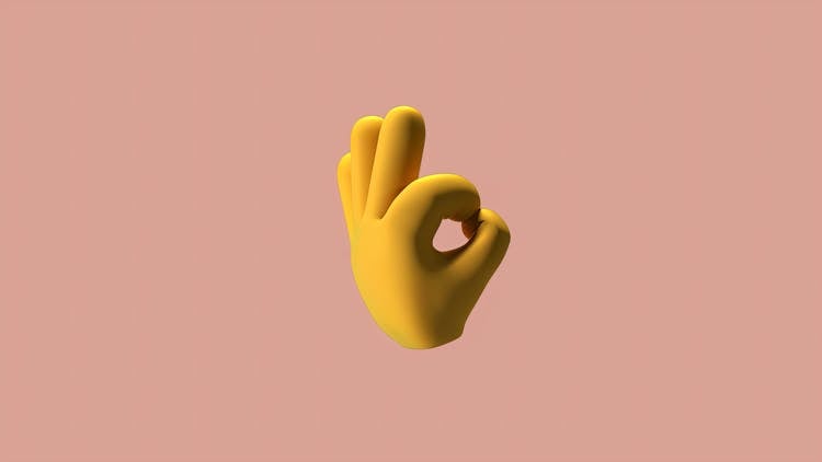 A  Yellow 3d Hand Illustration With An Ok Hand Gesture