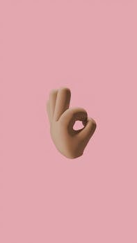 3D rendered OK hand gesture emoji on a soft pink background, perfect for positive communication visuals.