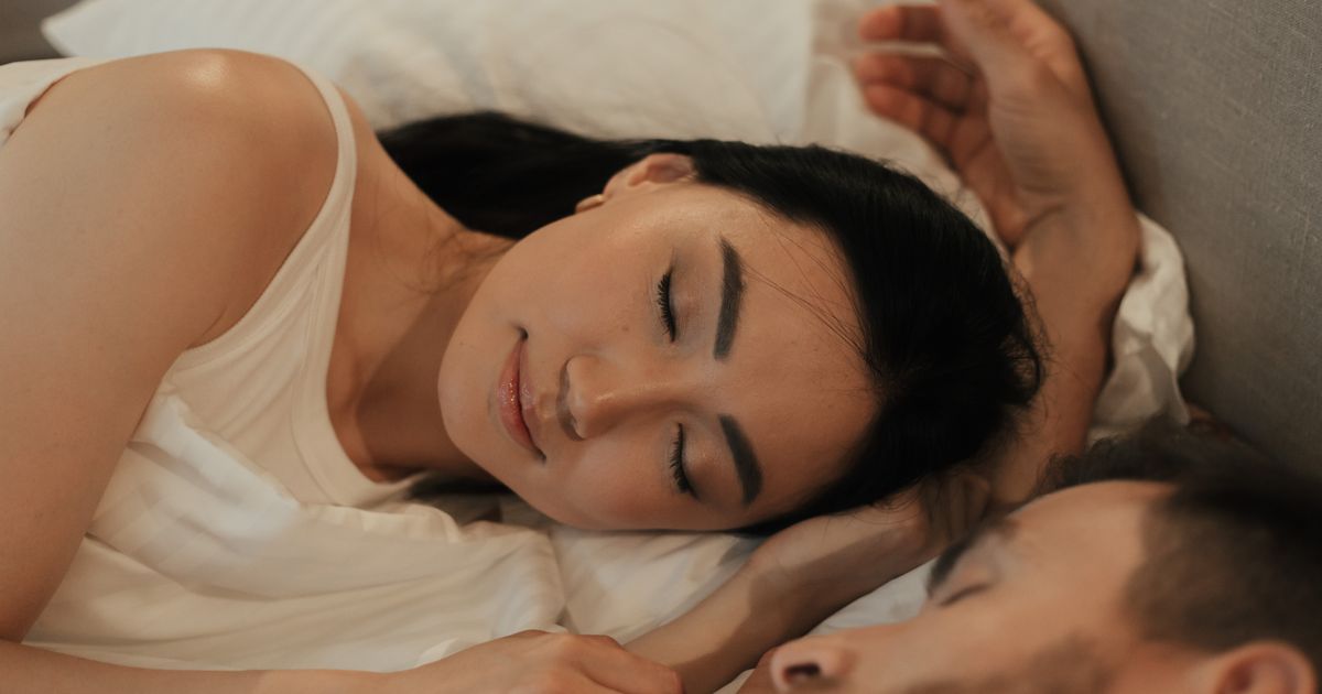 Couple sleeping and bedroom comfort — 22 Tips for Better Sleep with a Stuffy Nose