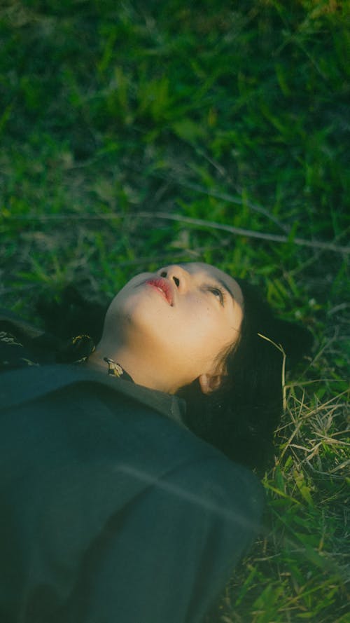 A Woman Lying on the Grass