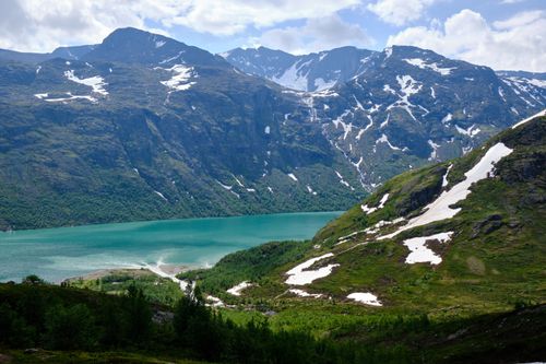 Free Breathtaking landscape of Besseggen Ridge with snow-capped peaks and turquoise lake in Norway. Stock Photo