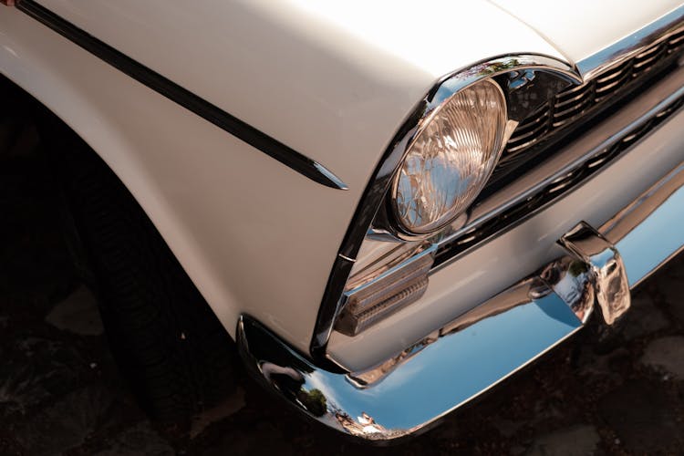 White Classic Car With Round Headlight