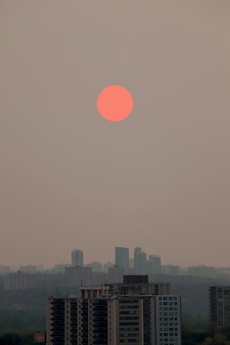 View Of The Moon In The City