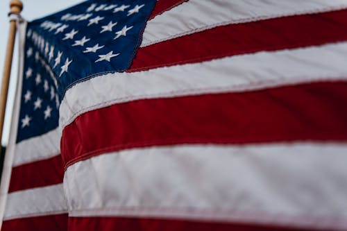 Photo of a Flag with White and Red Stripes