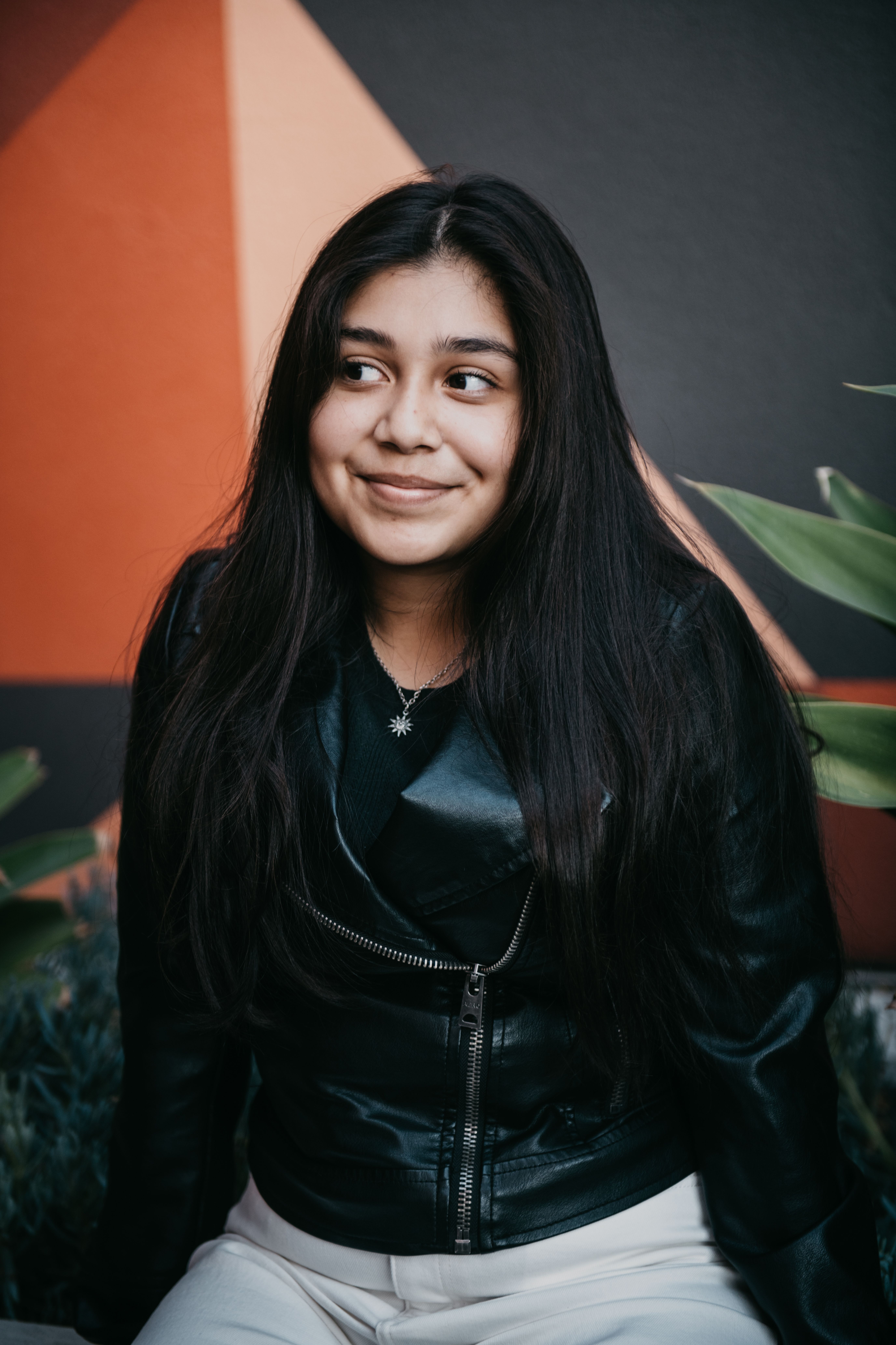 Woman in Black Leather Jacket Smiling · Free Stock Photo
