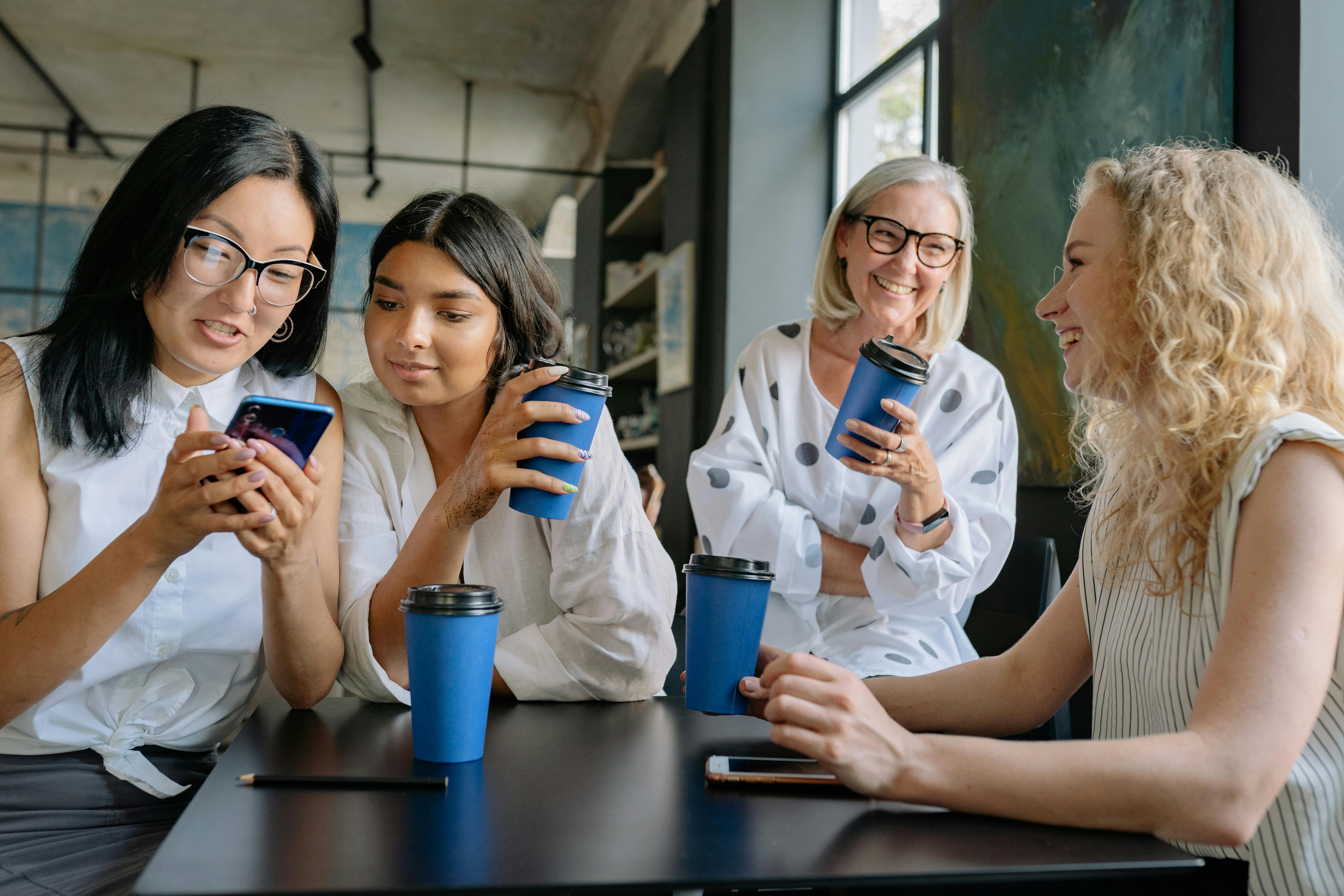 women sitting at the table