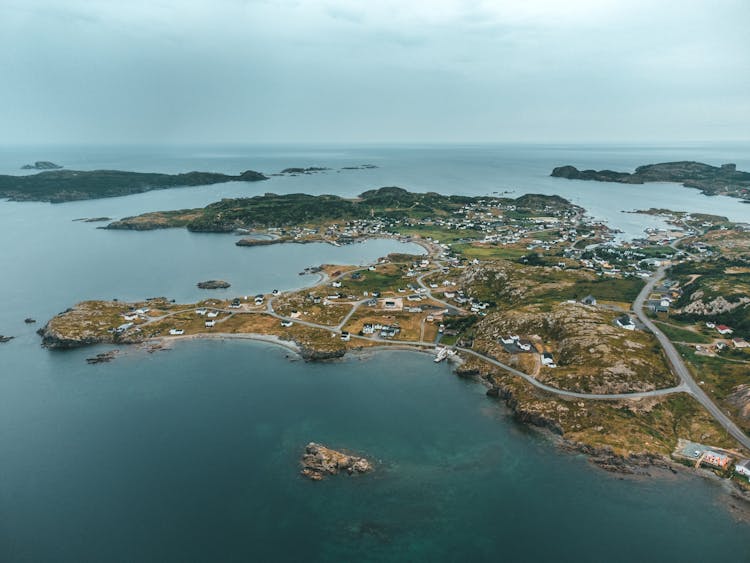 Houses On Island In Ocean