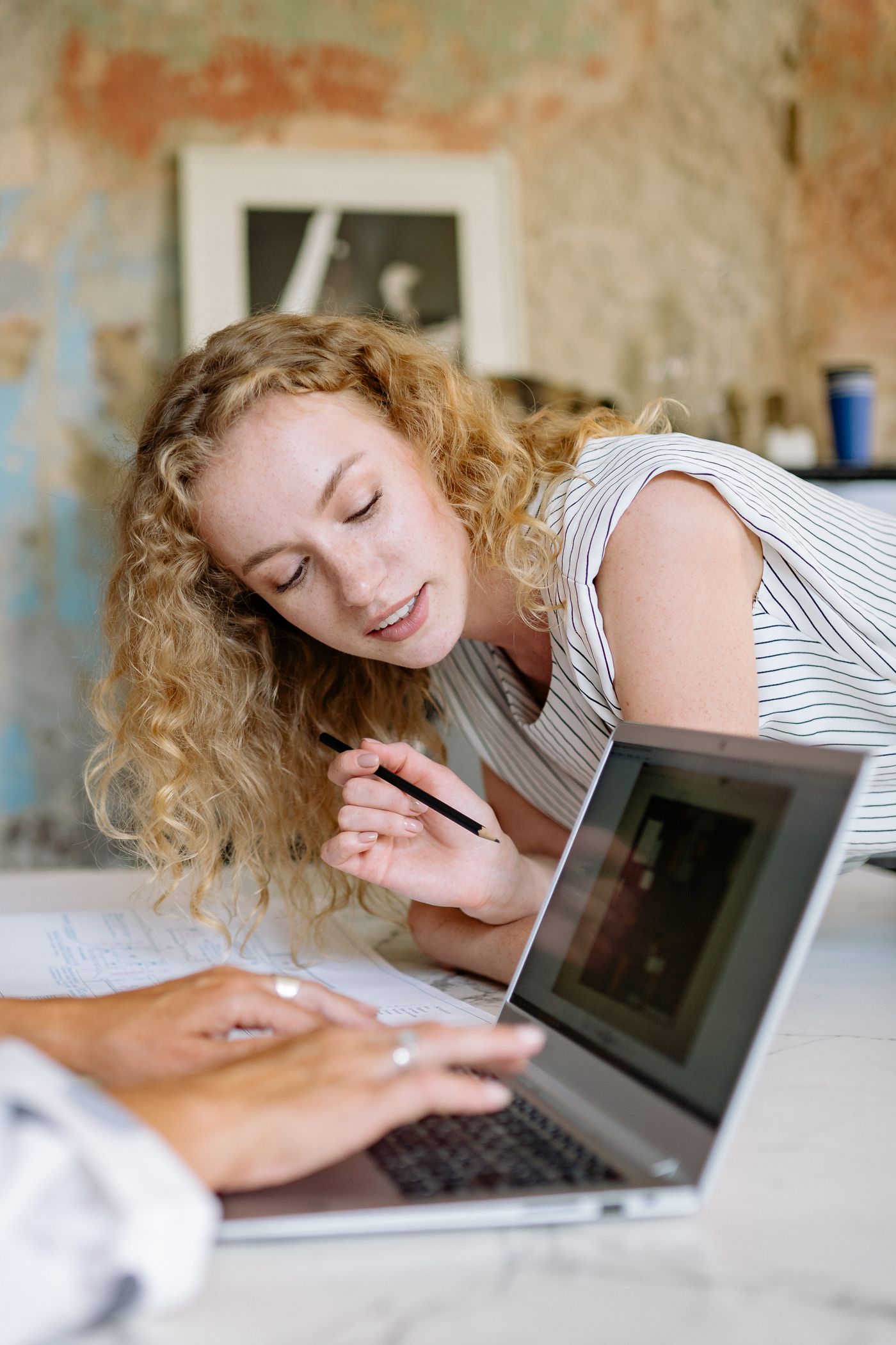 A woman working on a laptop
