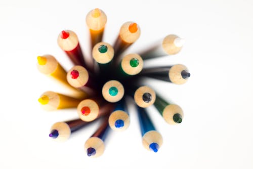Shallow Focus Photography of Color Pencil Lot