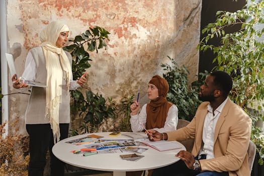 Multicultural business team in a creative meeting, discussing plans and ideas in a modern office.