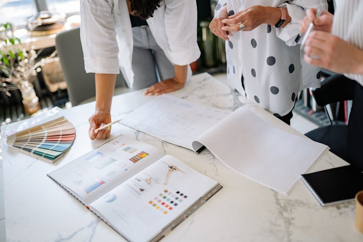 Office Team Looking At The Documents