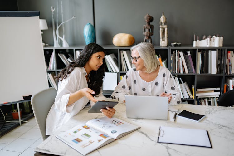 Women Having Discussion At Work