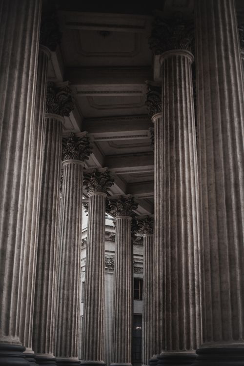 Free Captivating view of historic stone columns in an ancient architectural setting. Stock Photo