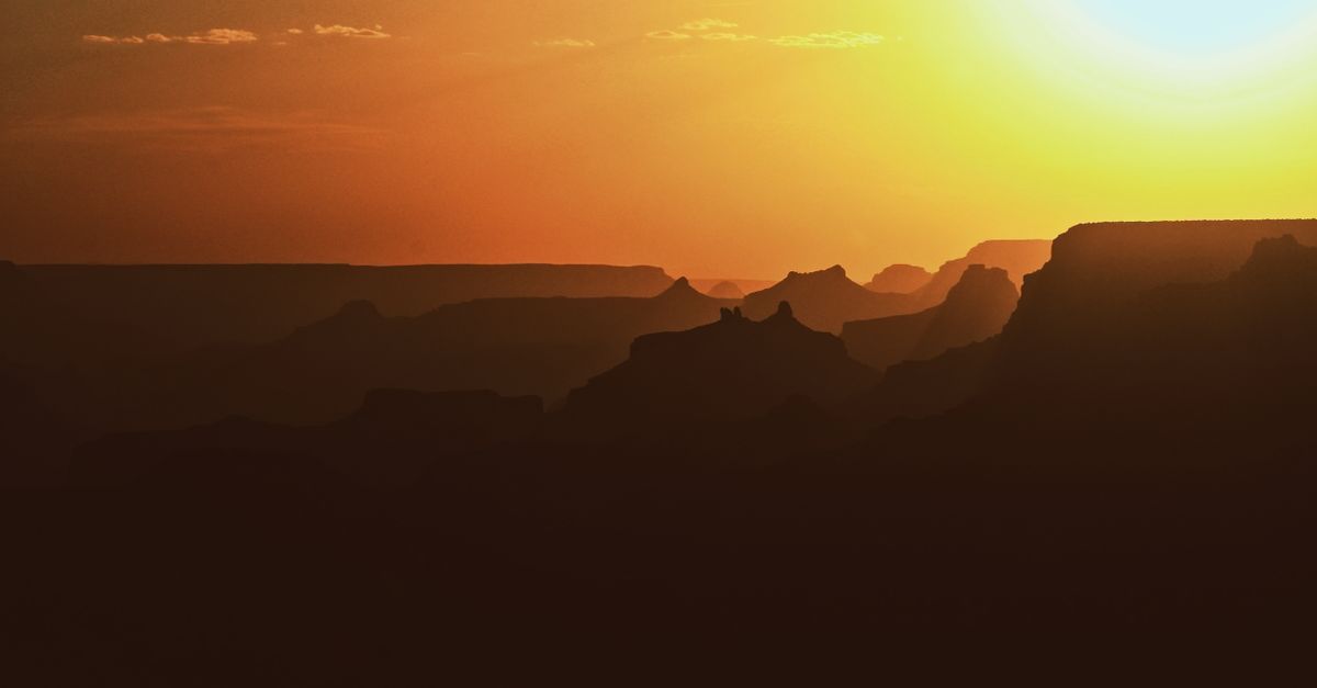 Beautiful silhouette of the Grand Canyon during a vivid sunset.
