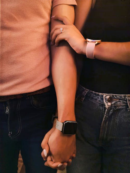 Free Close-up Couple Holding Hands  Stock Photo