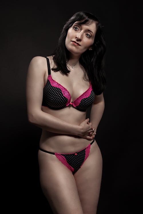 Free Woman in Black and Pink Polka Dot Lingerie Stock Photo
