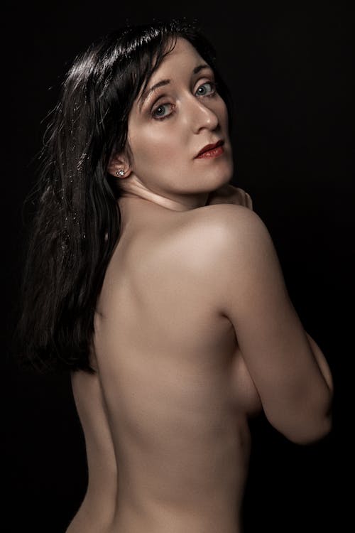 A Topless Woman With Red Lipstick