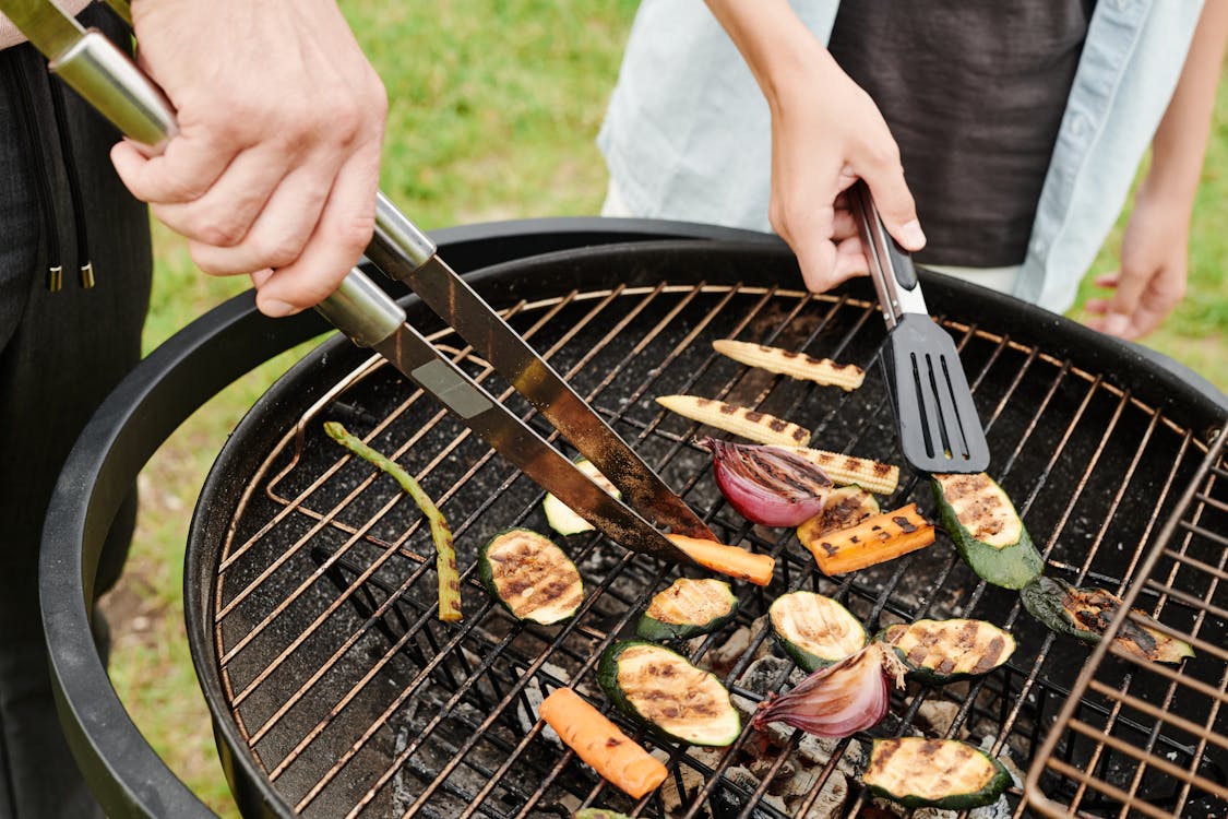 Free People Grilling Fresh Vegetable Stock Photo